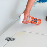 Spraying rust stain remover